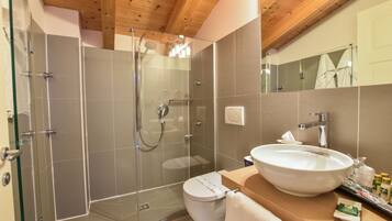 Rainfall showerhead, designer toiletries, hair dryer, bathrobes