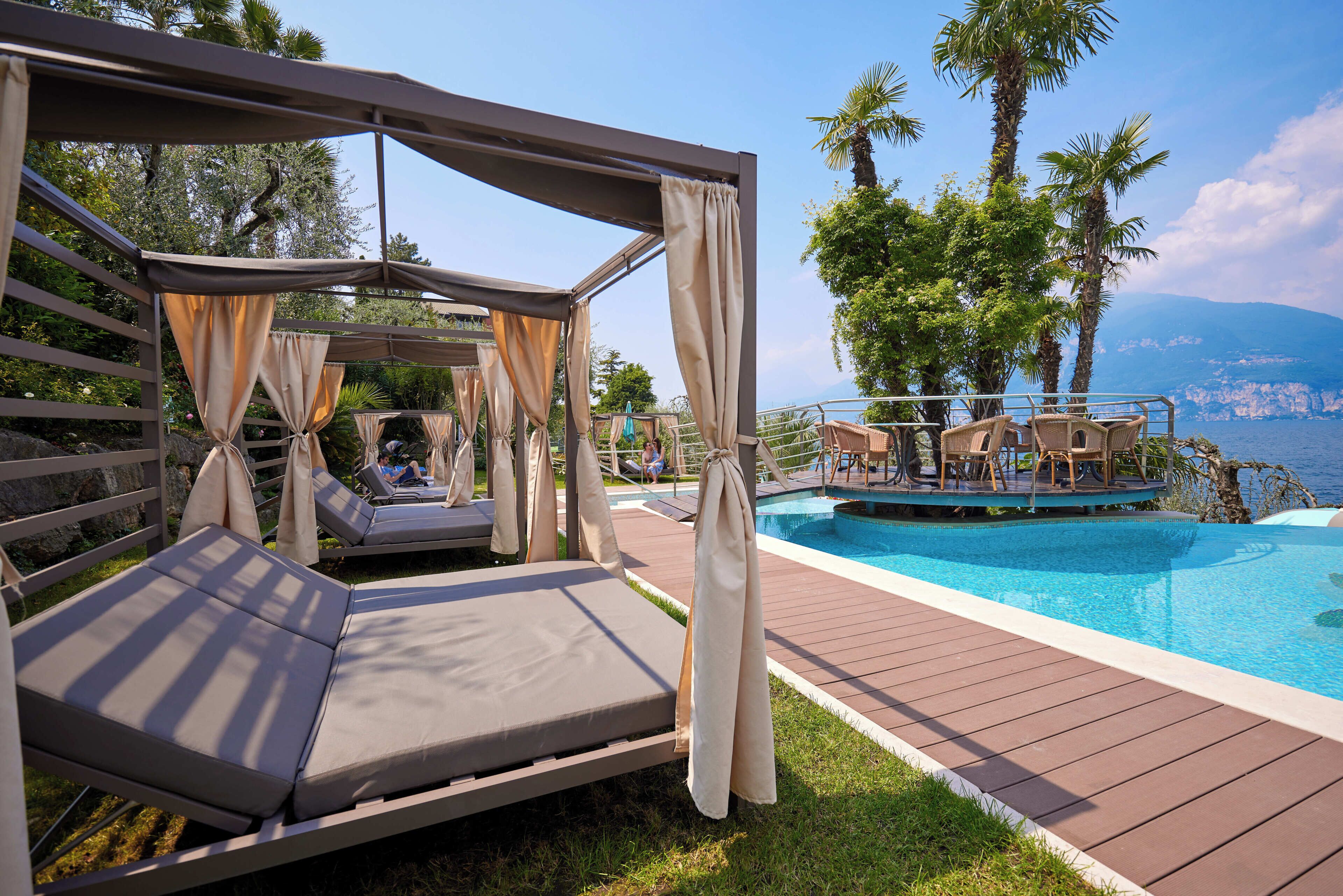 Seasonal outdoor pool, open 7:00 AM to 8:30 PM, pool umbrellas
