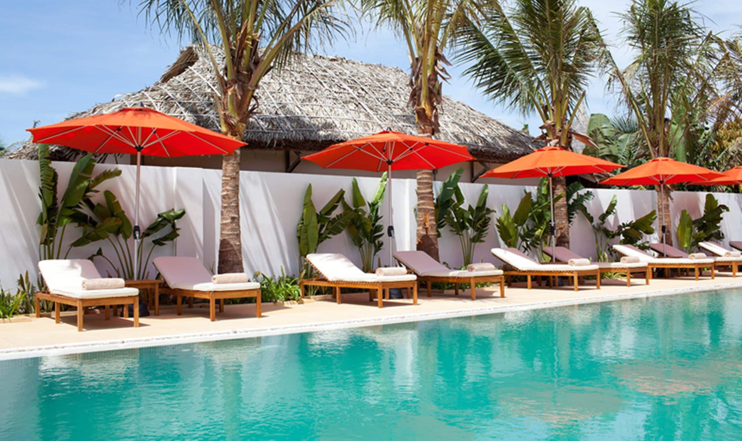 outdoor pool, pool umbrellas, pool loungers