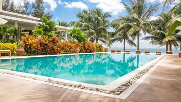 Outdoor pool, pool umbrellas, pool loungers