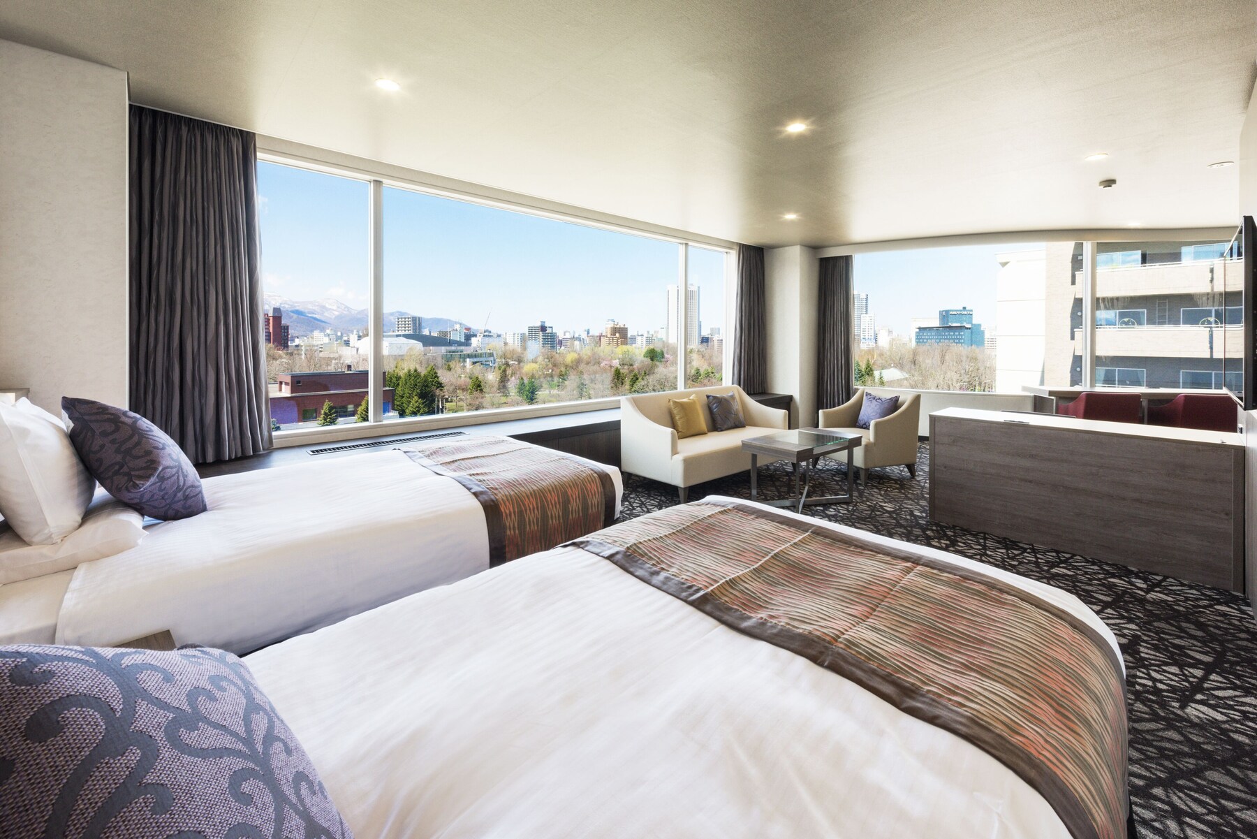 Premium bedding, down comforters, in-room safe, desk