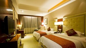 Executive Twin Room | Minibar, desk, blackout drapes, WiFi (free) - Eastar International Hotel (Chengdu)