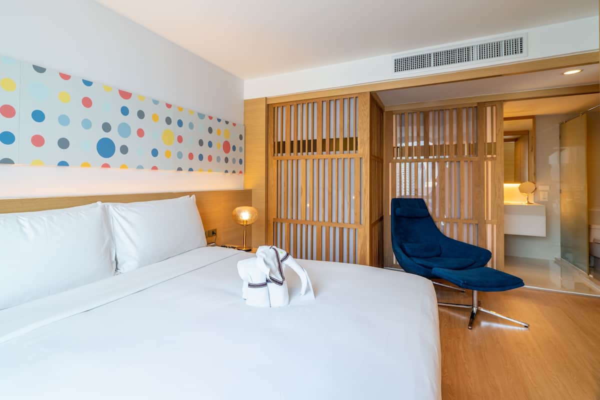 Glow Suite | 1 bedroom, pillowtop beds, minibar, in-room safe