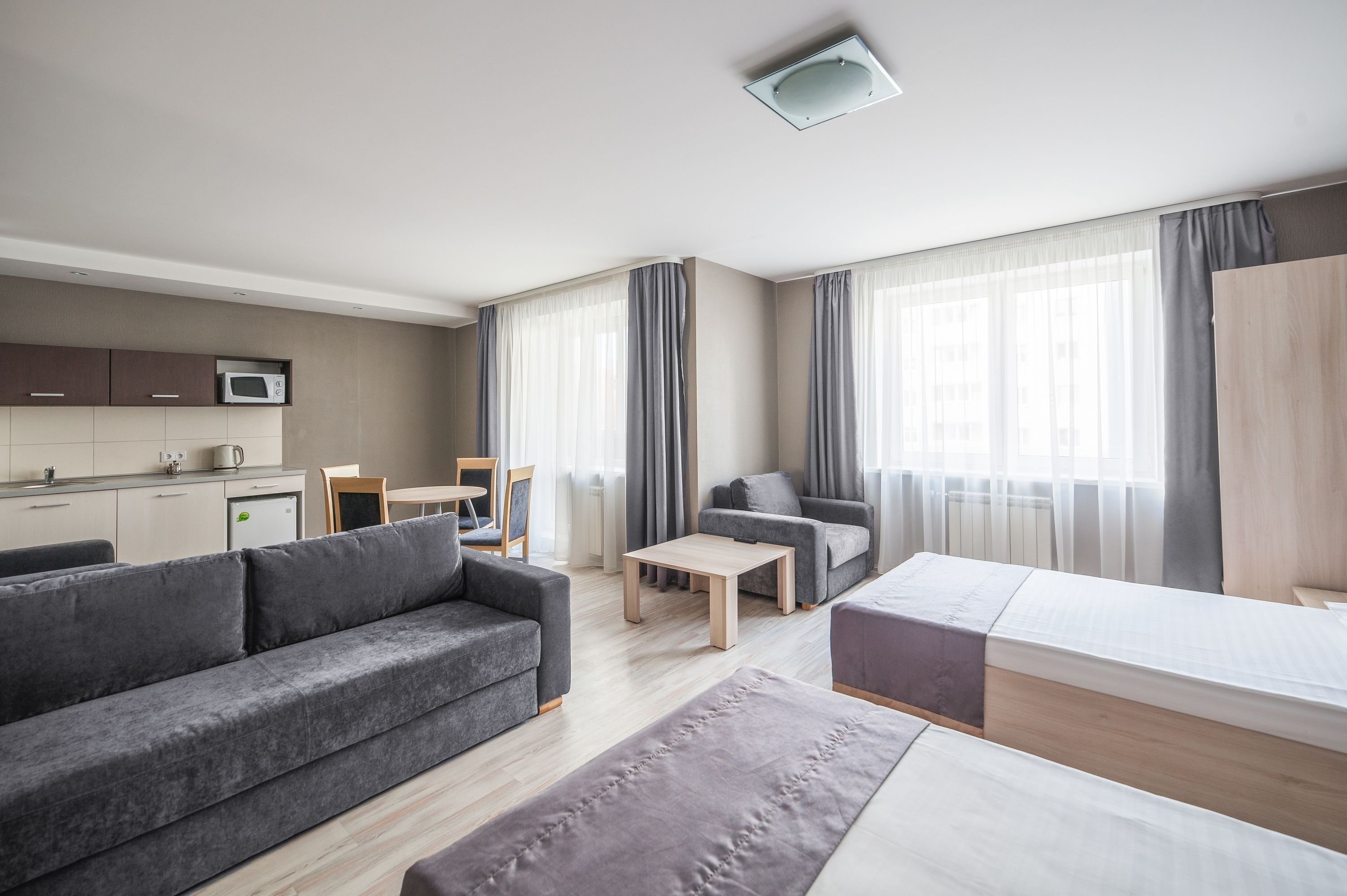 Apartamento, 1 habitación (Fitness) | Zona de estar | Una televisión LED