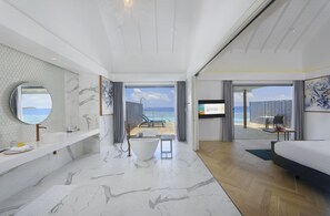 Separate tub and shower, rainfall showerhead, free toiletries - OUTRIGGER Maldives Maafushivaru Resort (Maafushivaru)