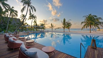Indoor pool, outdoor pool, pool umbrellas, sun loungers