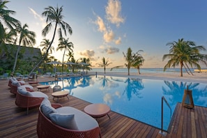 Indoor pool, outdoor pool, pool umbrellas, sun loungers