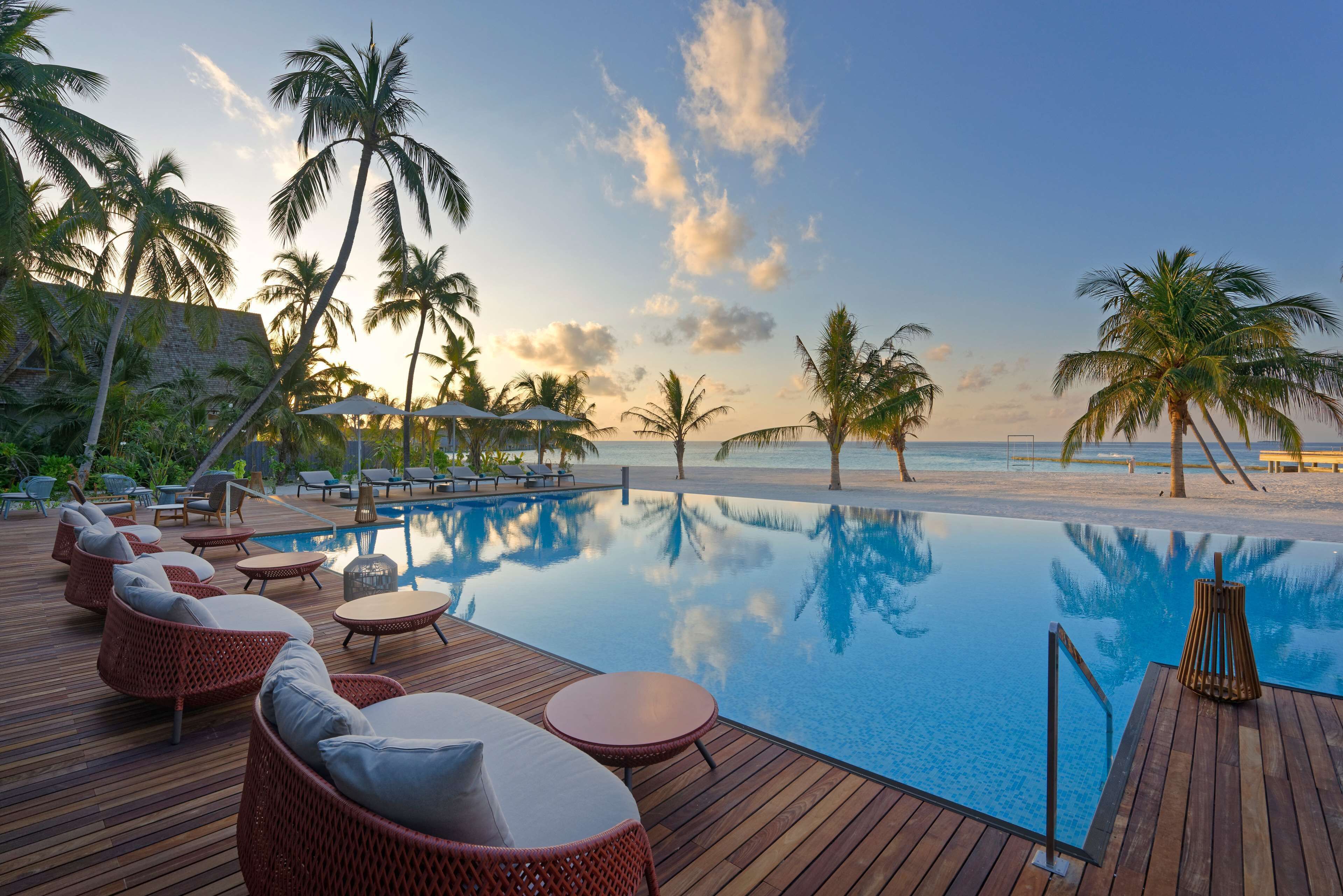 Indoor pool, outdoor pool, pool umbrellas, pool loungers