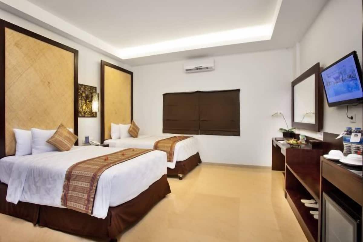 Hypoallergeen beddengoed, een minibar, een kluis op de kamer, een bureau