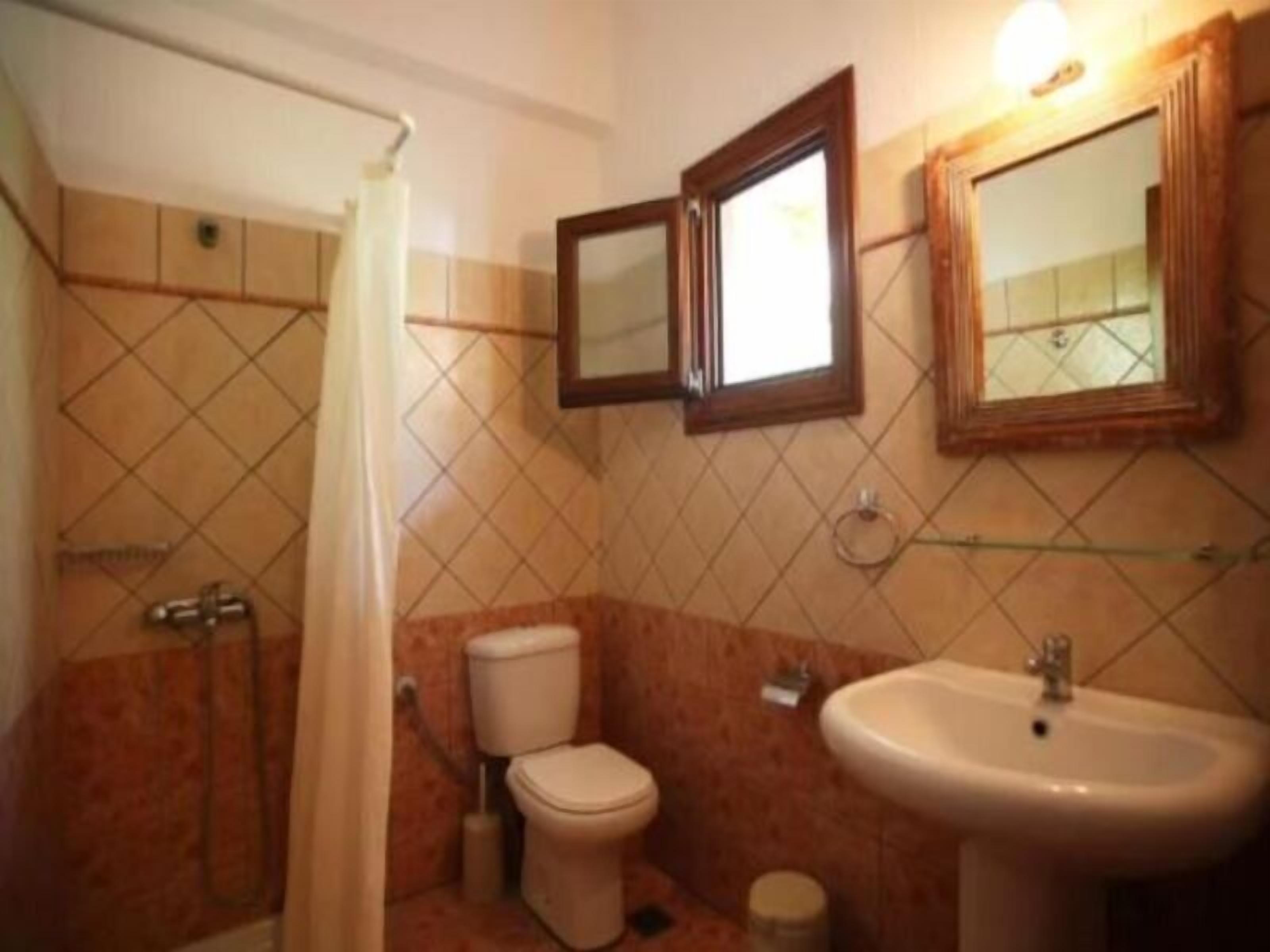standard room, garden view | bathroom | shower, hair dryer, towels