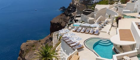 2 outdoor pools, pool umbrellas, sun loungers