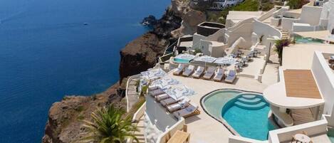 2 outdoor pools, pool umbrellas, sun loungers