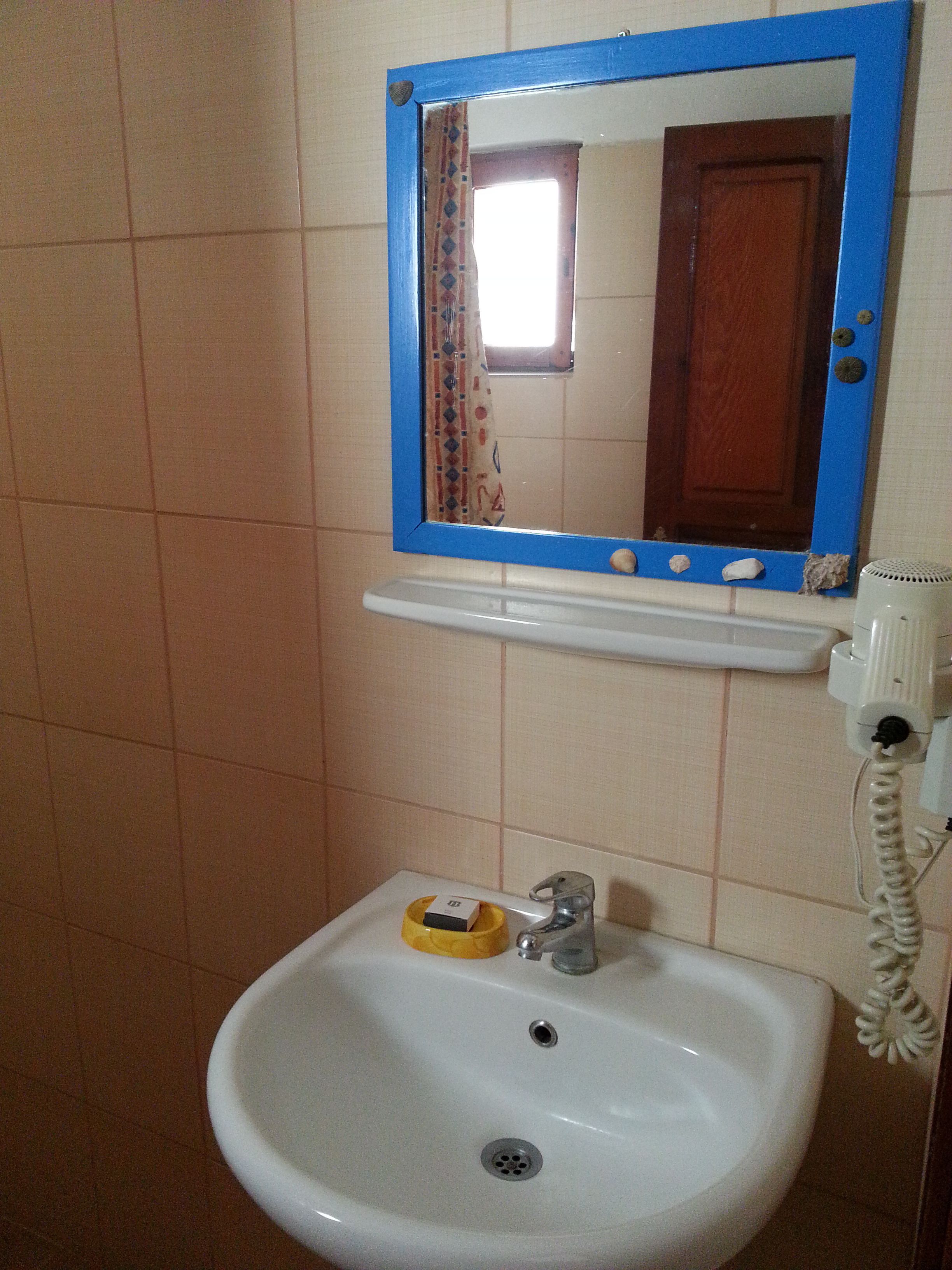 shower, free toiletries, hair dryer, slippers