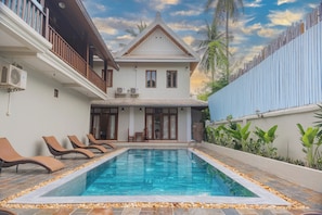 Outdoor pool, sun loungers
