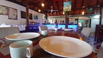 Breakfast, lunch, dinner served; Eastern European cuisine, pool views