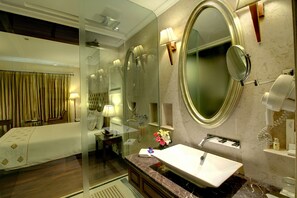 Shower, rainfall showerhead, slippers, towels - The Pllazio Hotel (Gurugram)