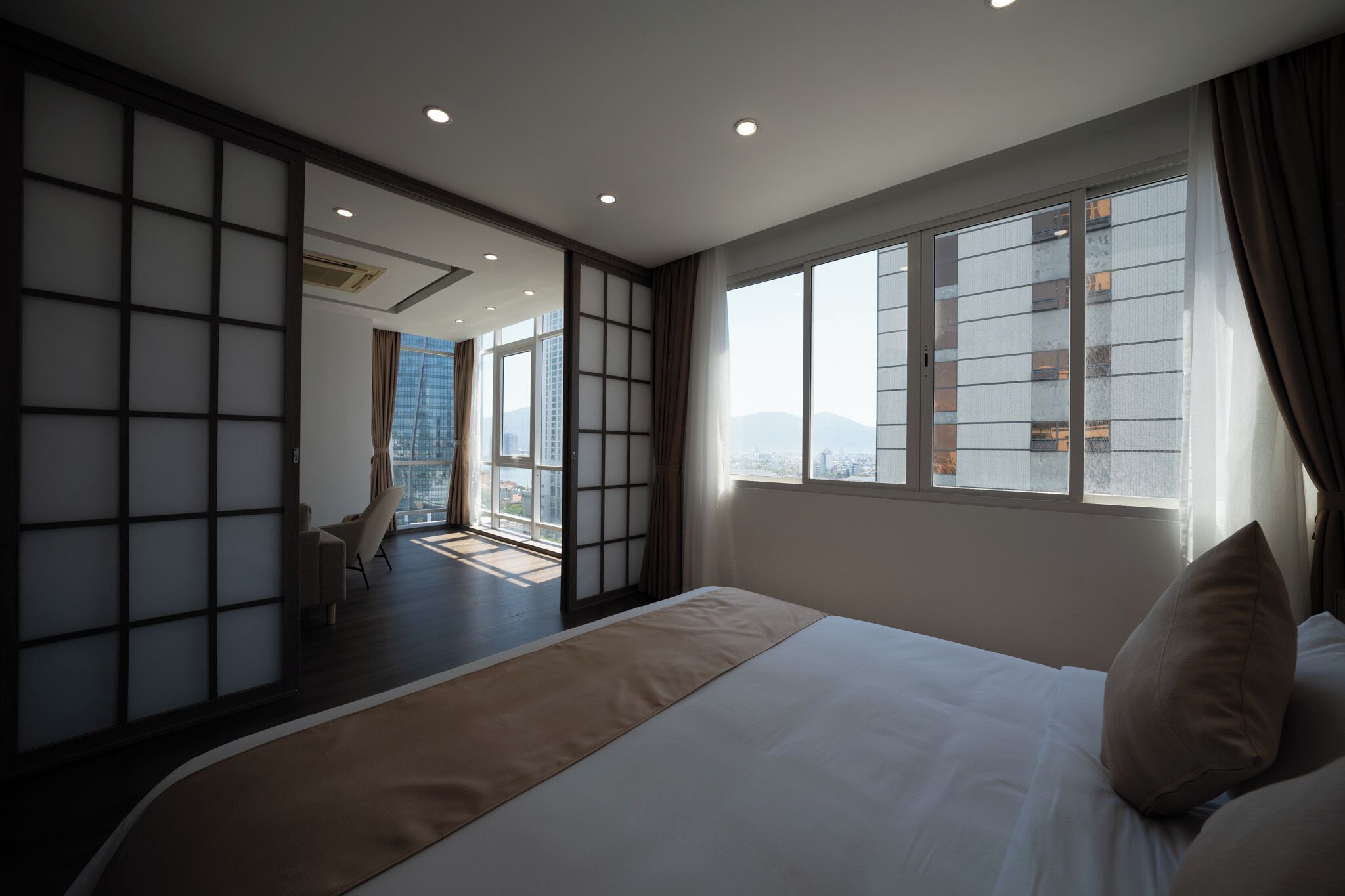 Luxury Suite, City View | Minibar, in-room safe, desk, blackout drapes