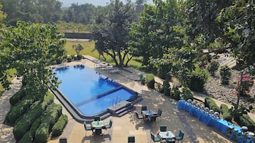 Outdoor pool, open 8 AM to 7 PM, sun loungers