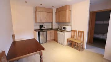 Apartamento, 1 habitación | Cocina privada | Frigorífico, microondas, placa de cocina y lavavajillas
