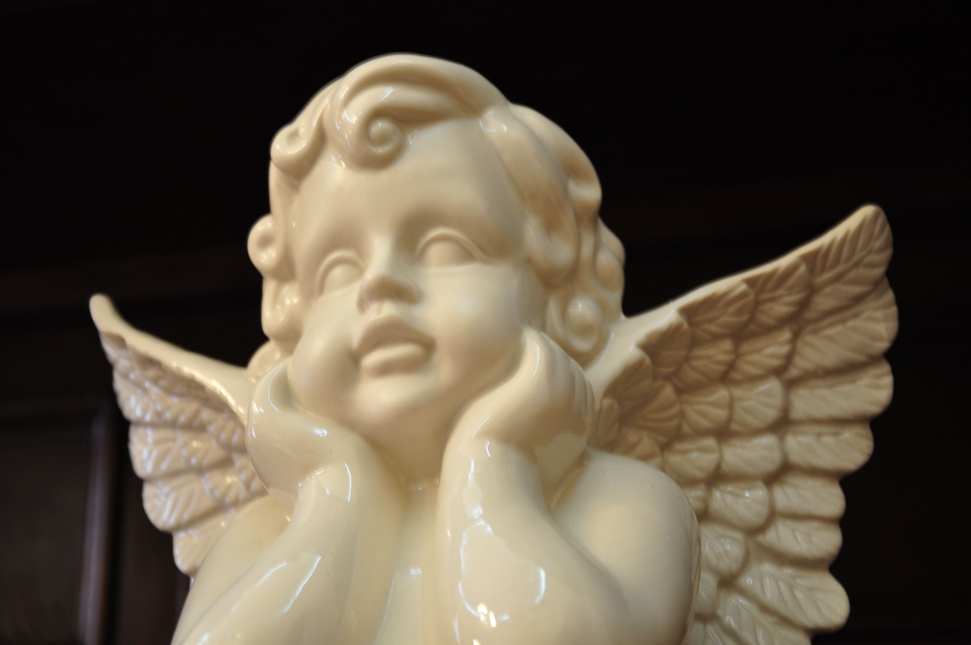 A statue of an angel with outstretched wings.