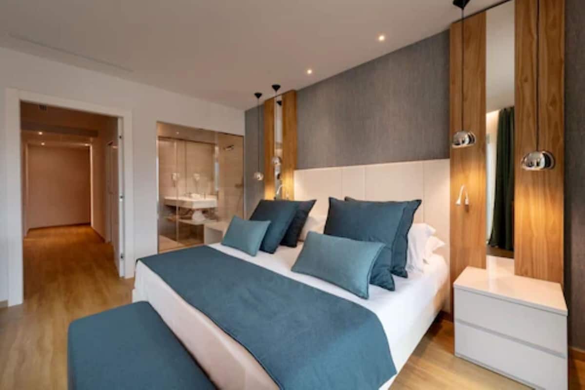 Suite, 1 cama Queen size, para no fumadores | 1 habitación, ropa de cama de alta calidad, edredón y minibar