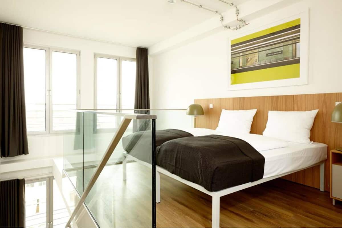 Junior Suite, City View | Blackout drapes, WiFi (free), bed sheets