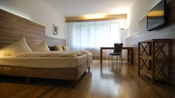 Apartament empresarial | 1 dormitori, roba de llit hipoal·lergògena i decoració individual