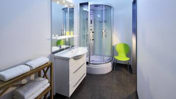 Shower, hair dryer, towels, soap