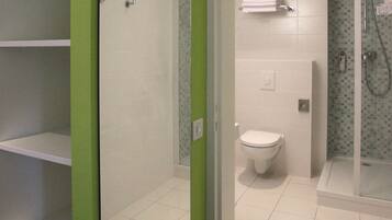 Eco-friendly toiletries, hair dryer, towels