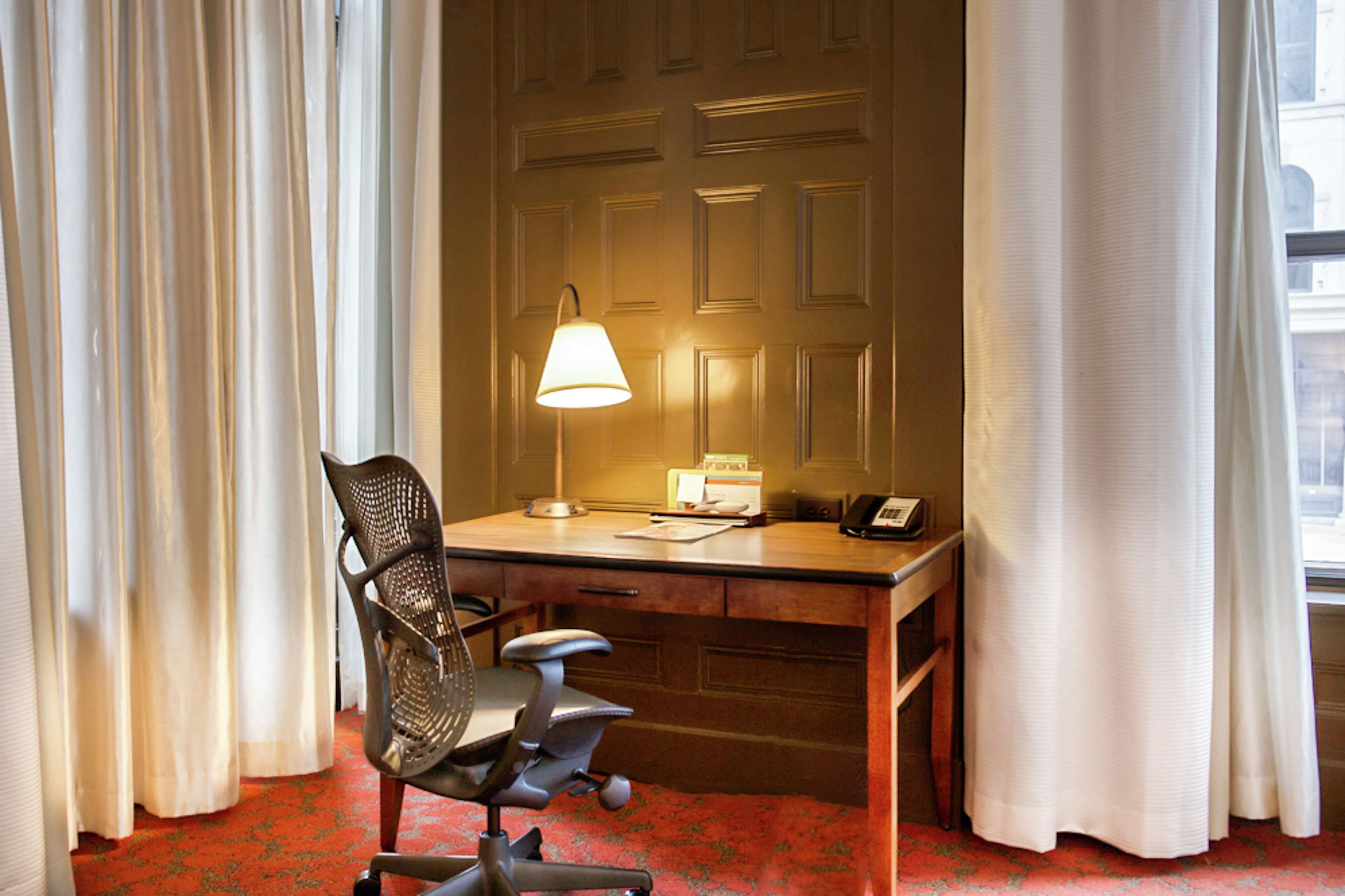 suite, one king bed | premium bedding, in-room safe, desk, iron/ironing board