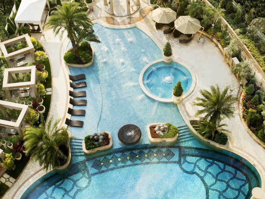 Indoor pool, seasonal outdoor pool, pool umbrellas, pool loungers