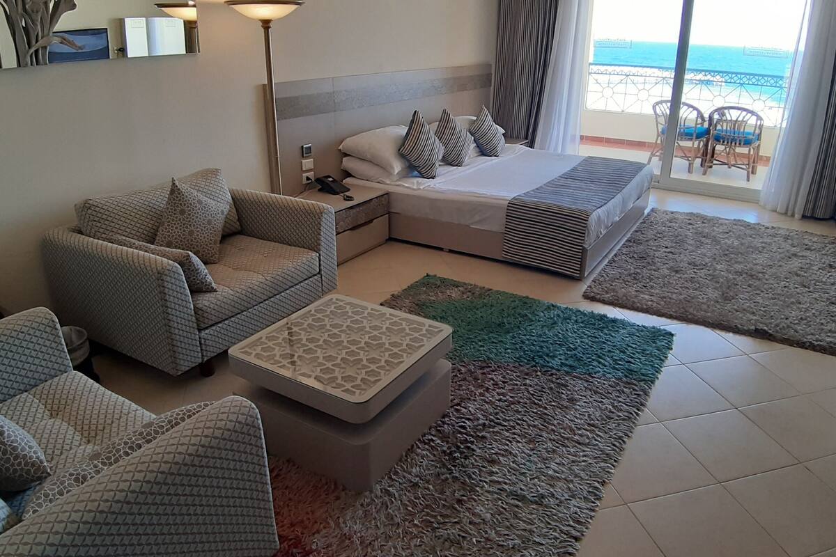 deluxe family beach front view | in-room safe, individually furnished, desk, blackout curtains