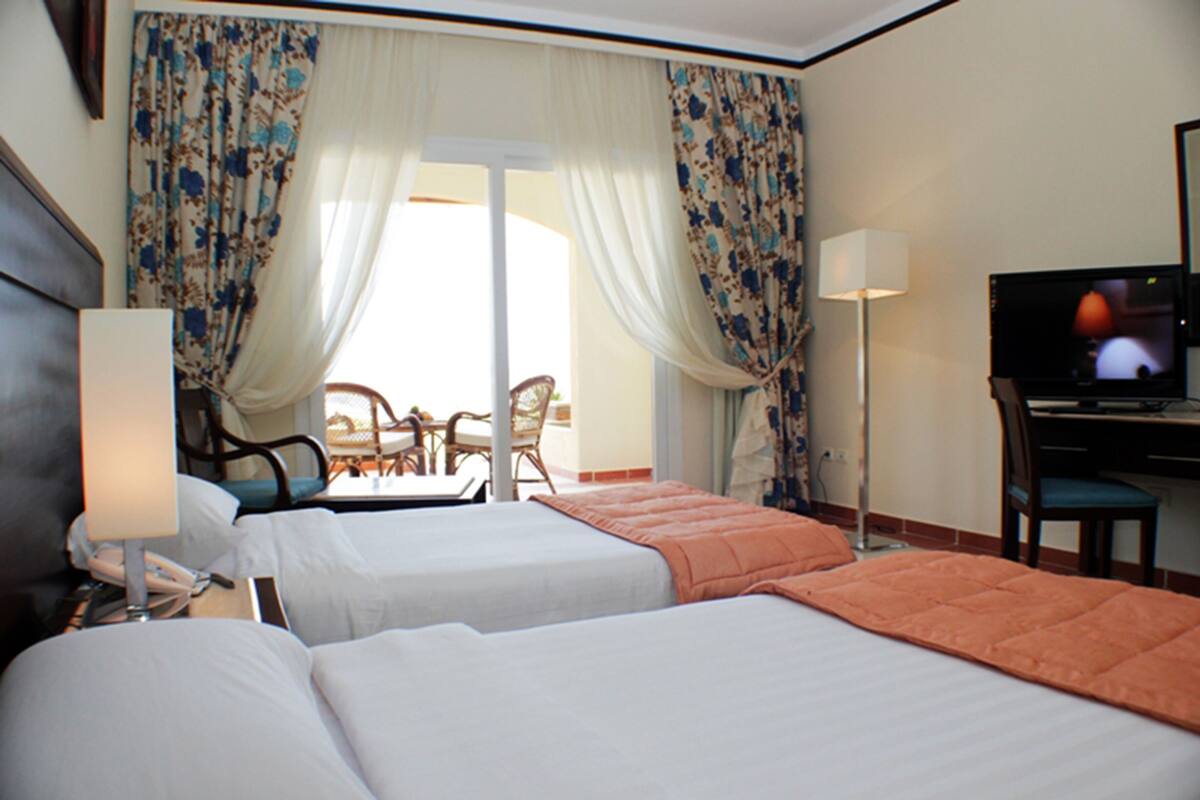 superior room, garden view | in-room safe, individually furnished, desk, blackout curtains