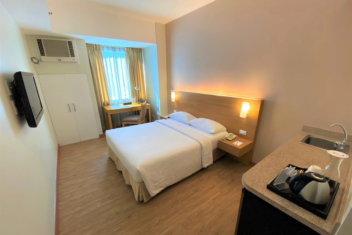 Estudio estándar | 1 habitación, minibar y caja de seguridad en la habitación