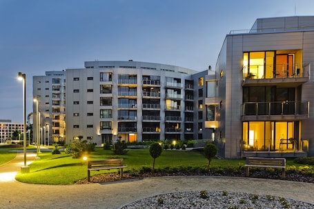 Front of property - evening/night. Triton Park Apartments