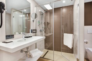 Shower, eco-friendly toiletries, hair dryer, towels