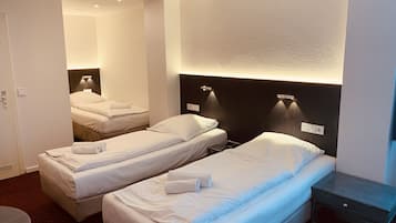Triple Room | Living area | Flat-screen TV