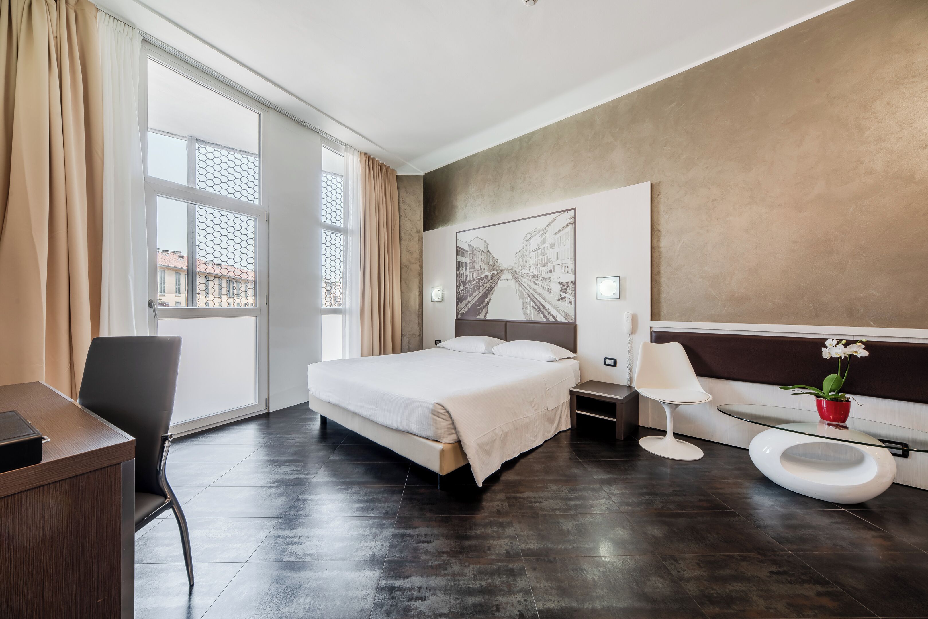 junior suite, terrace | down duvets, minibar, in-room safe, individually furnished