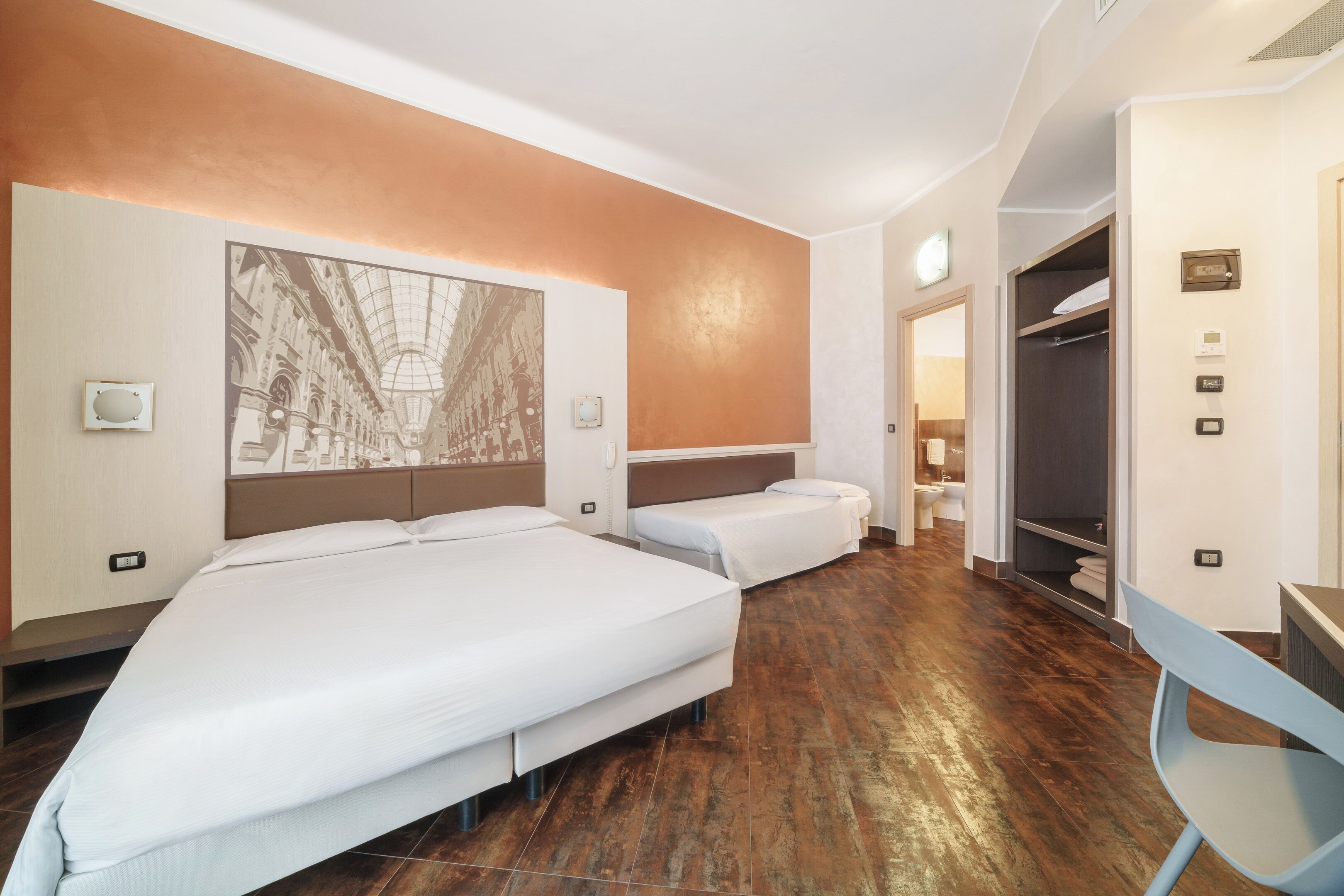 Deluxe Triple Room, City View | Down comforters, minibar, in-room safe, individually furnished