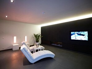 42-inch TV with digital channels, iPod dock