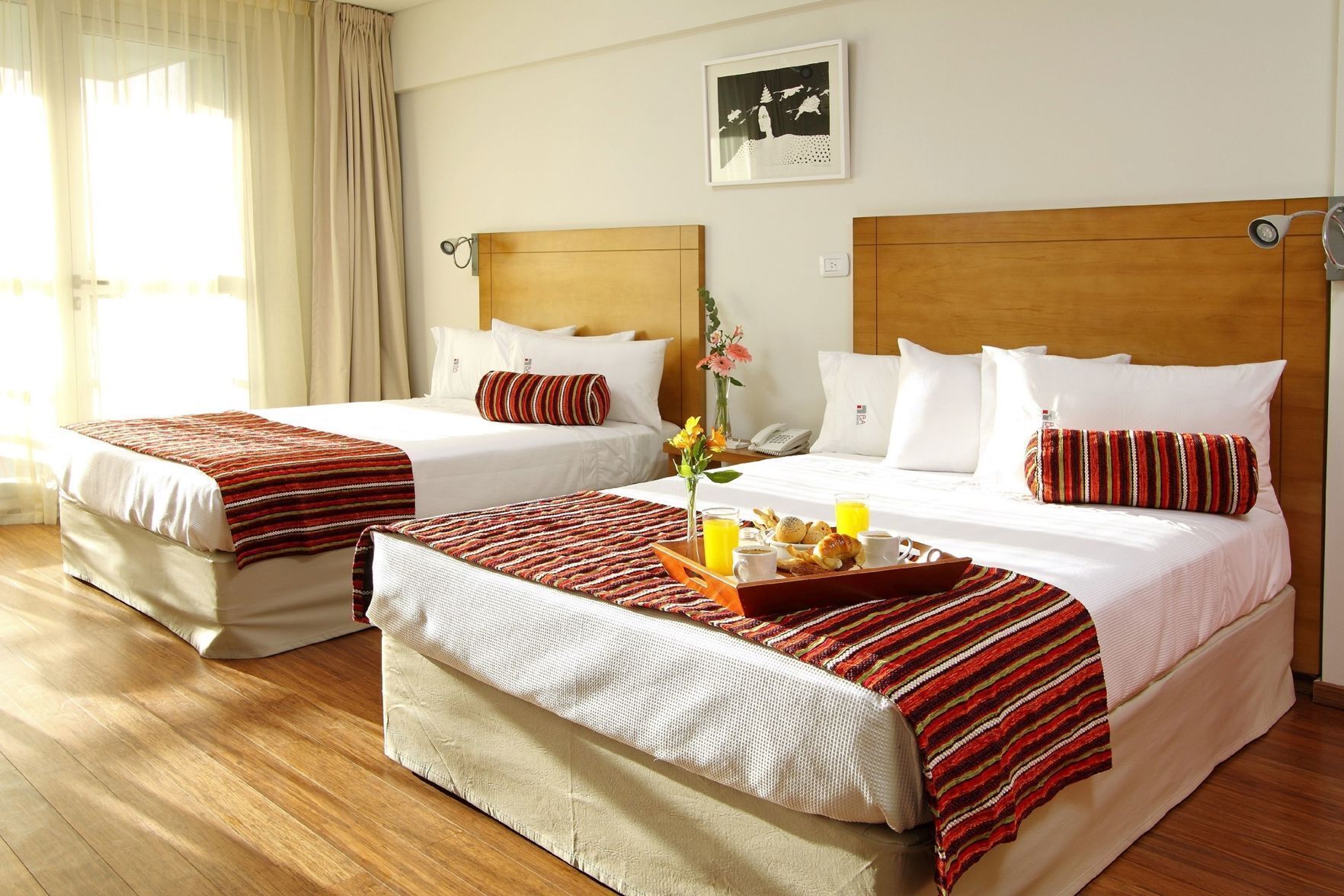 Premium bedding, down comforters, minibar, in-room safe