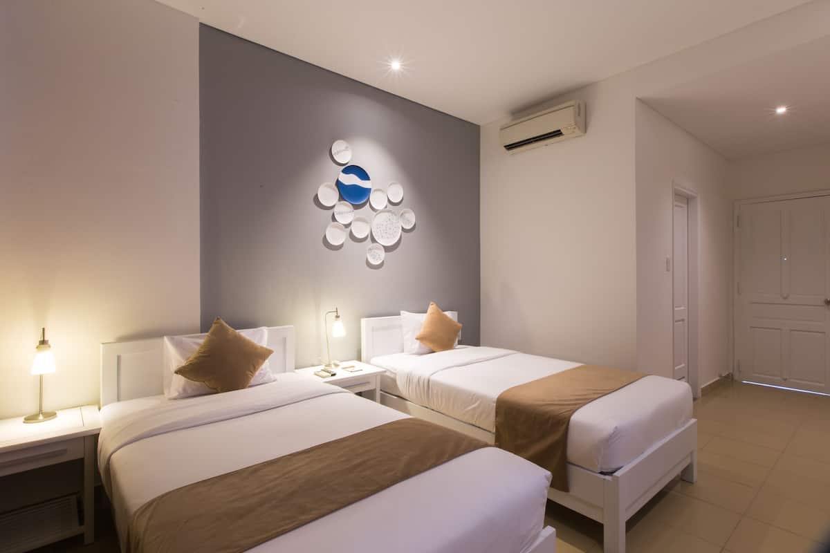 Camera Superior con letto matrimoniale o 2 letti singoli | Minibar, una cassaforte in camera, una scrivania, tende oscuranti