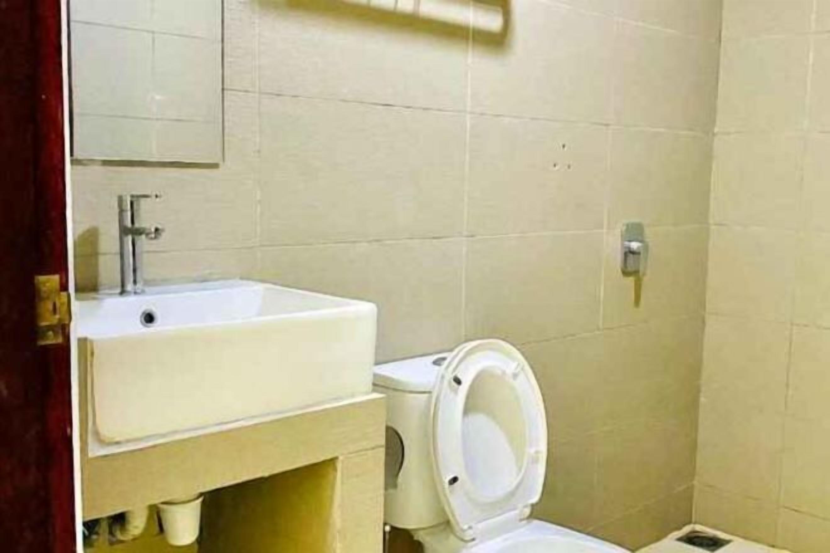 Bathroom | Shower, rainfall showerhead, hair dryer, towels
