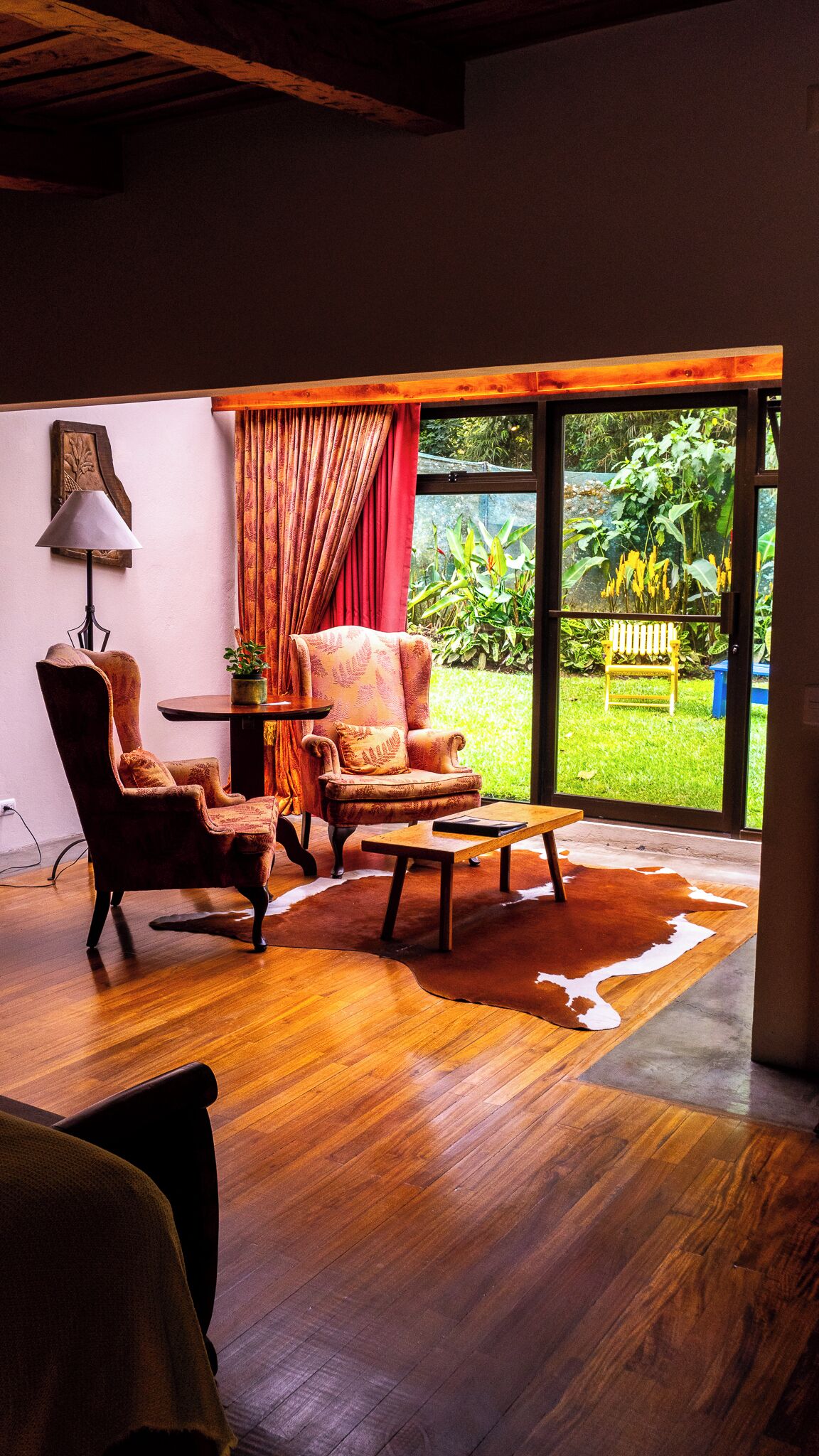 luxury suite, fireplace, garden view | living area