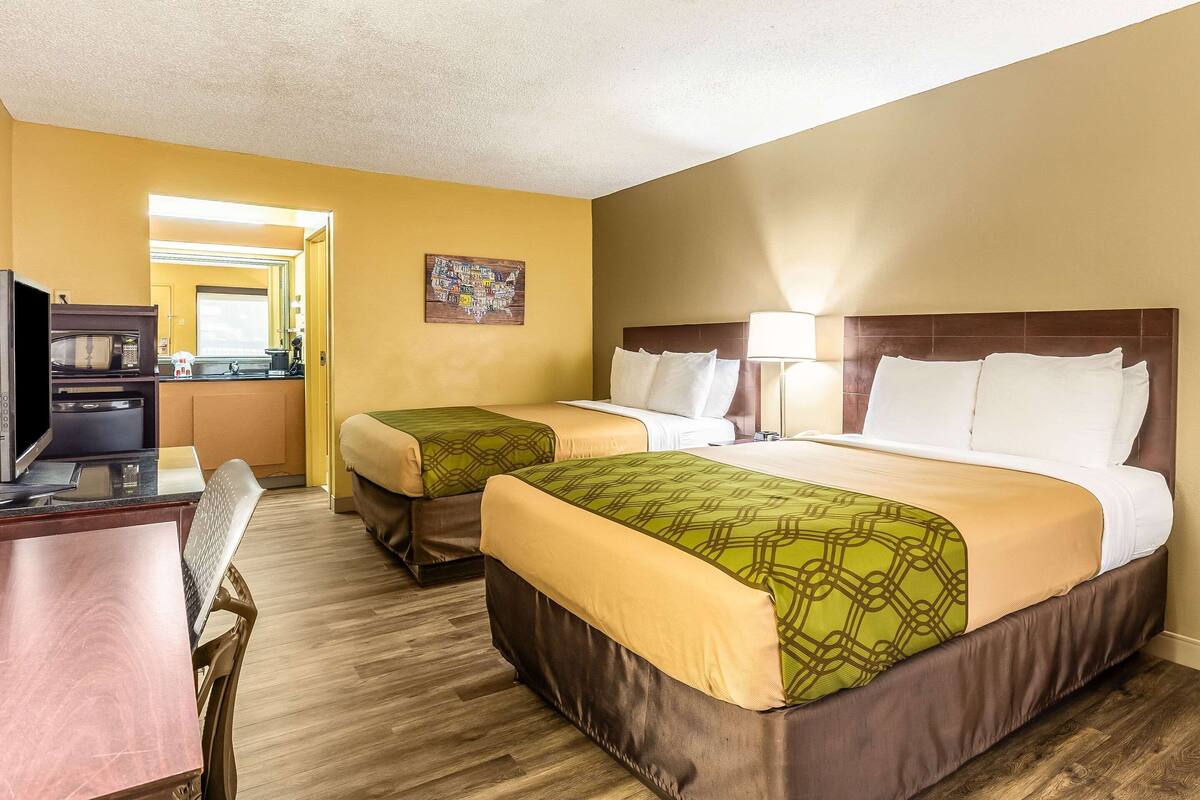 Premium bedding, pillowtop beds, desk, blackout drapes