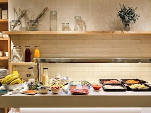 A buffet setup with various food items and beverages. - Musik Boutique Hotel - Adults Only (Barcelona)