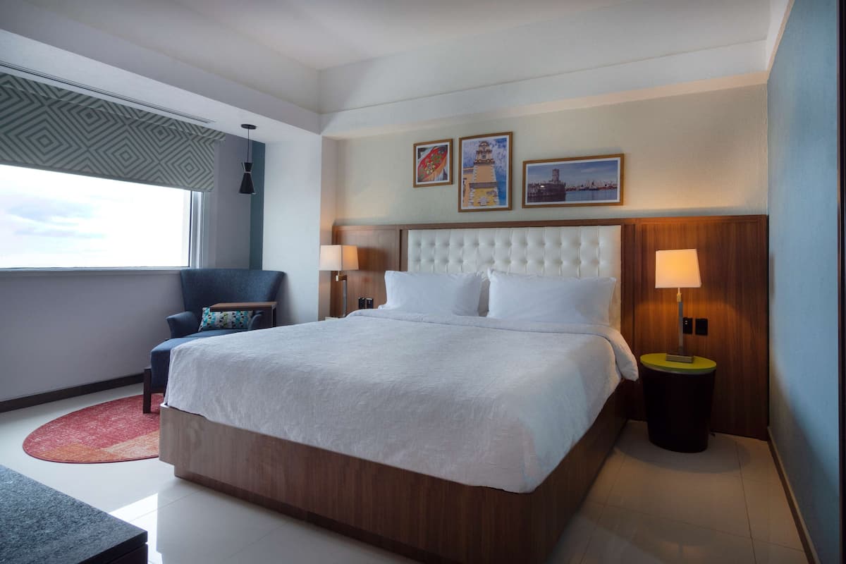 Hypo-allergenic bedding, down comforters, in-room safe, desk