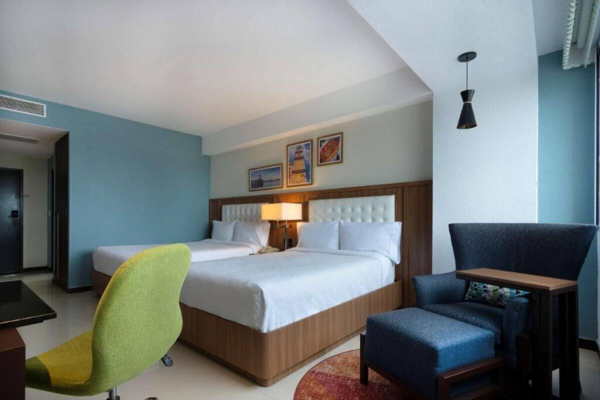 Hypo-allergenic bedding, down comforters, in-room safe, desk