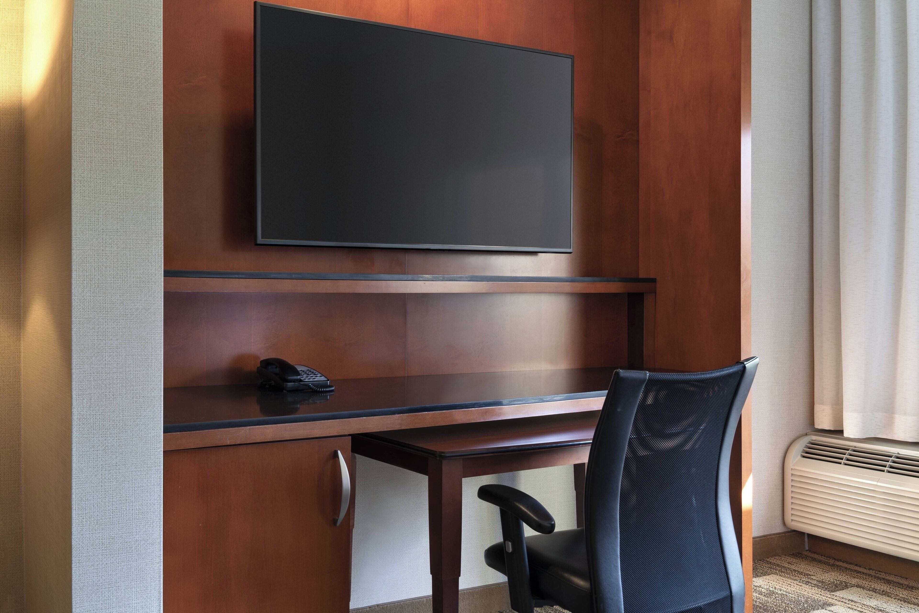 desk, blackout curtains, iron/ironing board, free cots/infant beds