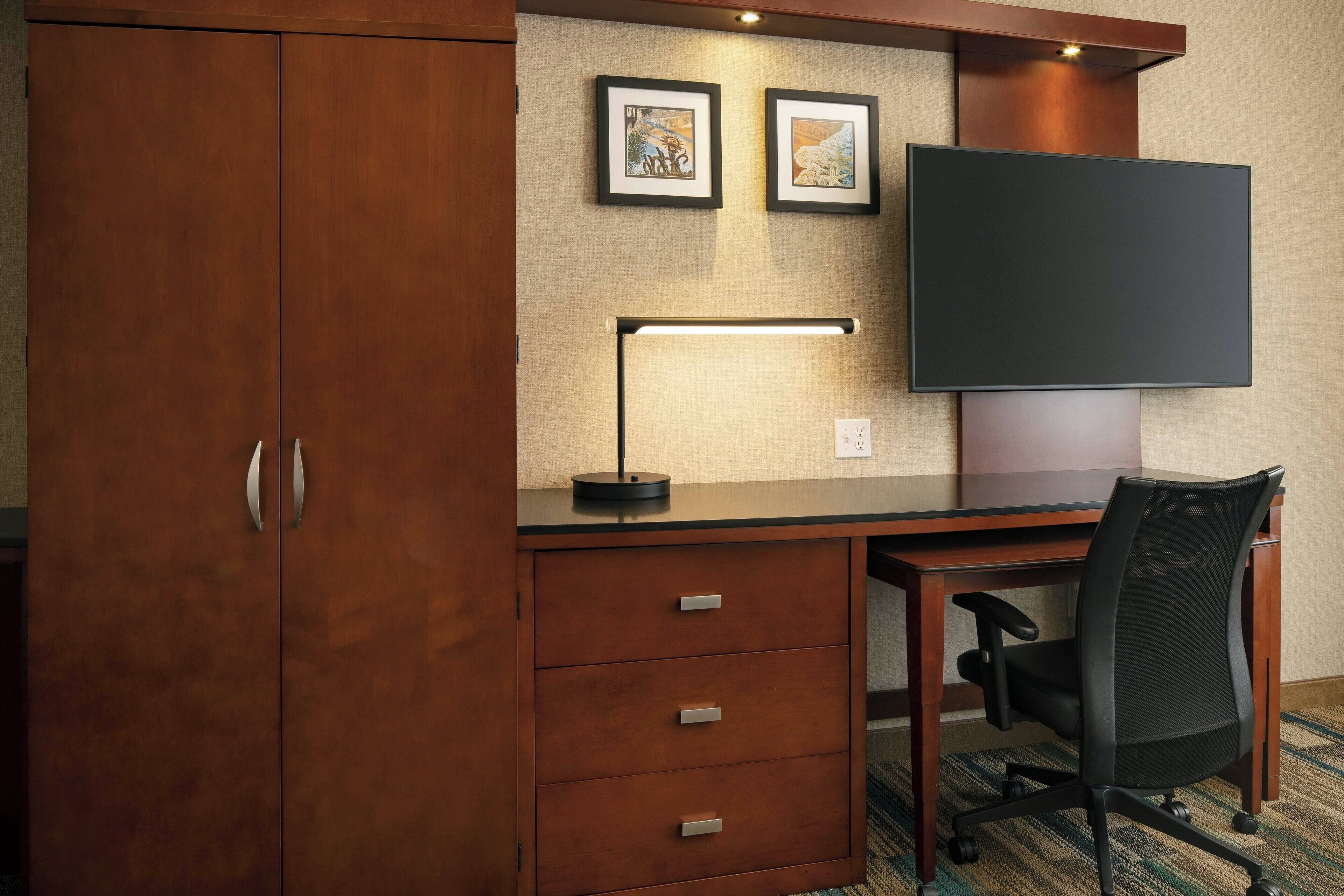 desk, blackout curtains, iron/ironing board, free cots/infant beds